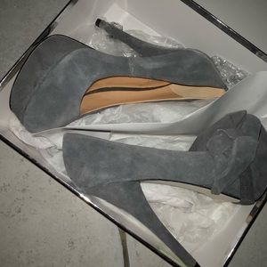 Grey platform heels with side bow. Size 7